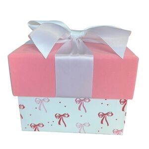 Pink and White Gift Box with Bow Design